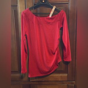 Red off-shoulder top with embellished silver strap